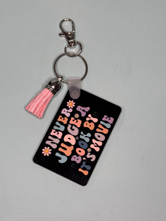 "Never Judge a Book by its Movie" Rectangle Keychain with Tassel